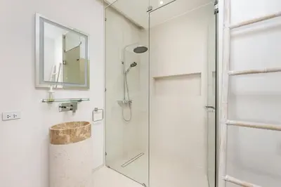 a bathroom with a shower with a glass door at Luxury 3BR Villa Wallaya with Private Pool in Bang Tao Beach