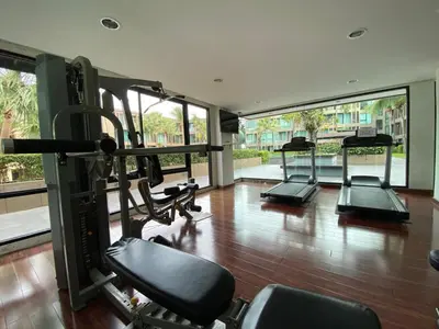 a gym with several tread machines in a room at The Pixel Cap Panwa Sea front Condominium - By Lovly in Ban Ao Makham