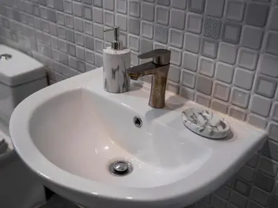 a white sink in a bathroom with a toilet at 3 Bedroom Villa with Pool near Fitness street in Ban Klang