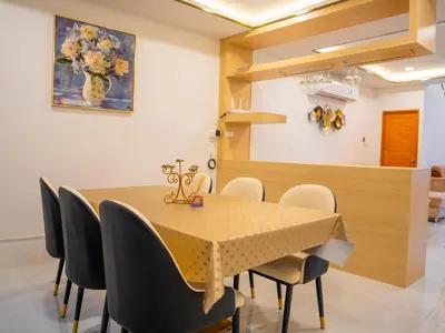 a dining room with a table and chairs at 3 Bedroom Villa with Pool near Fitness street in Ban Klang