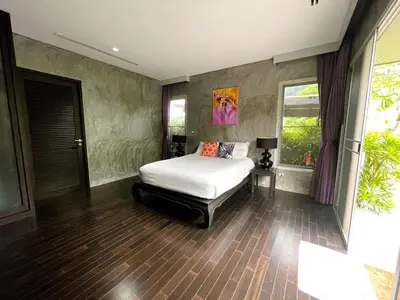 a bedroom with a bed and a window at 11 - Peaceful Escape on Naiyang Beach in Nai Yang Beach