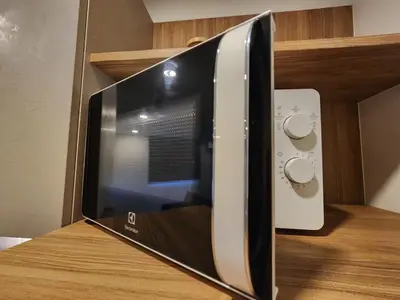 a microwave oven sitting on top of a counter at Cozy Apartment-1BR T2-524 in Chalong