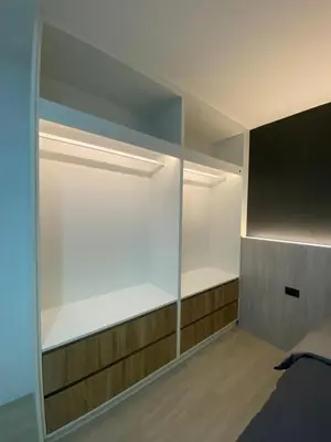 a walk in closet with a glass door at Apartment in Rawai in Ban Saiyuan (1)