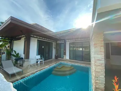 a villa with a swimming pool and a house at Pool Villa Private near Rawai Beach 2 bedrooms 3D9 in Rawai Beach