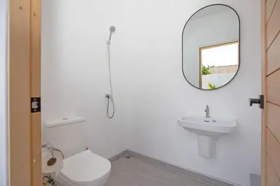 a white bathroom with a sink and a mirror at 3BR Villa Sunset Garden 12 - Private 18m Pool in Rawai in Rawai Beach