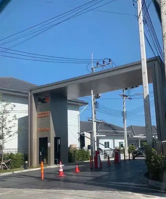 a gas station with orange cones in front of it at The Rich Villas Palai in Chalong