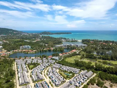 an aerial view of a marina with a lot of cars at Laguna Park Townhouse by Villacarte in Laguna Phuket