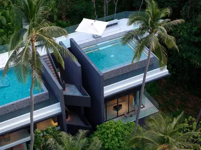 an aerial view of a house with a swimming pool at Villa Zai in Kata Beach