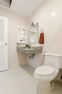 a bathroom with a toilet and a sink at 2 bed townhouse, best location, Patong in Patong Beach