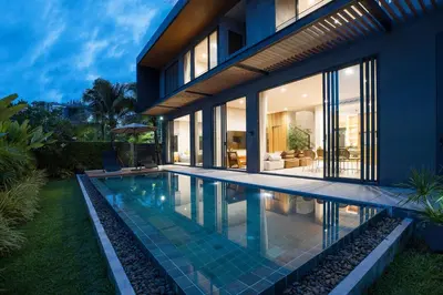 a house with a swimming pool in front of it at Chalong Bay View 3BR Pool Villa Long One A4 in Chalong