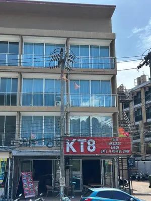 a tall building with a sign in front of it at KT8 Hotel AoNang in Ban Khlong Haeng