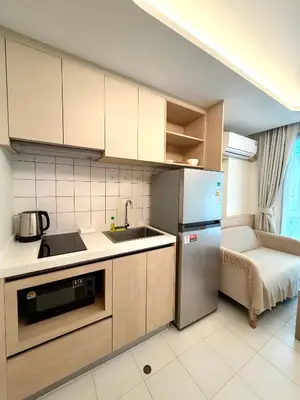 a kitchen with a sink and a refrigerator at 1-bd apartment on Kamala beach in Kamala Beach