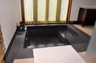 a black floor in a room with a window at Salika Luxury 5.5 Bed Villa Seaview With Maids in Rawai Beach