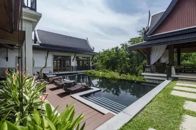 an external view of a villa with a swimming pool at Salika Luxury 5.5 Bed Villa Seaview With Maids in Rawai Beach