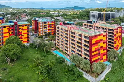 an overhead view of a city with colorful buildings at апартаменты NBC Nai Harn in Rawai Beach