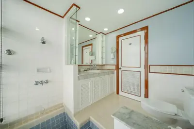 a bathroom with a sink and a shower and a toilet at The Lake Front Laguna Alla13 in Laguna Phuket