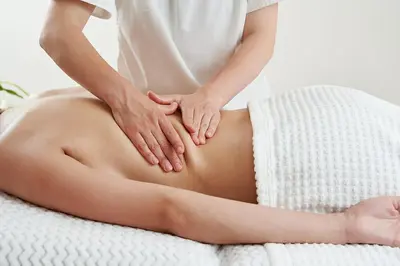 a woman getting a massage from a therapist at Boho Apartment in Mai Khao Beach