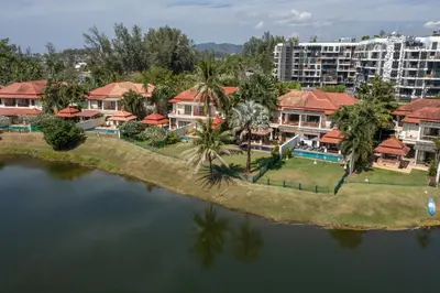 an aerial view of a resort with a body of water at Golden Cotton Villa 3BR Lagoon View by GRF in Laguna Phuket