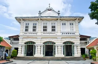 a large white building with white windows at xx Mitr INN Phuket Oldtown - มิตร ภูเก็ต in Phuket Town