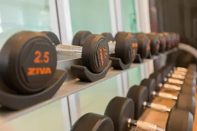 a row of dumbbells on display in a gym at W Phuket in Phuket Town