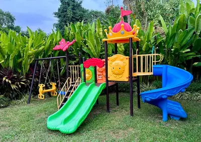 a playground with colorful slides and a crown on it at 4 BR Jacuzzi Pool Villa with Playground, near Layan, Laguna, Bang Tao beach in Ban Pak Lak
