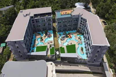 an aerial view of a resort with pools at Duplex in NaiHarn Residence near the Beach, UTL B325 in Rawai Beach