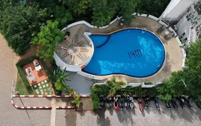 an overhead view of a swimming pool at a resort at Patong Tower in Patong Beach
