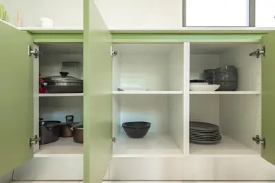a cupboard with dishes and pots and pans at V193 Next-Door Villas 6BR 2 Pools For Group Vibe! in Rawai Beach
