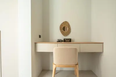 a desk with a chair and a mirror at Mouana Breeze Mai Khao 4-bedroom Pool Villa 9925 in Mai Khao Beach