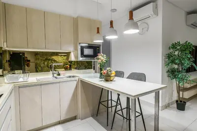 a kitchen with a sink and a counter at Lux 2Bdr Cassia Laguna With Own Large Terrace in Laguna Phuket
