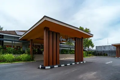 a building with a sign on the front of it at Lux 2Bdr Cassia Laguna With Own Large Terrace in Laguna Phuket