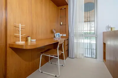 a home office with a desk and a chair at The Trinity new modern 5BR villa with 20M Pool in Thalang