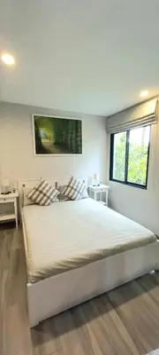 a bedroom with a large white bed with two pillows at B8 Ватсап669З5В2I976 in Nai Yang Beach