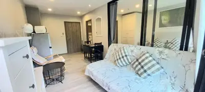 a living room with a couch and a table at B8 Ватсап669З5В2I976 in Nai Yang Beach