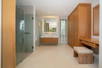 a bathroom with a glass shower and a sink at 3 Bedroom Villa with Private pool in Laguna Phuket