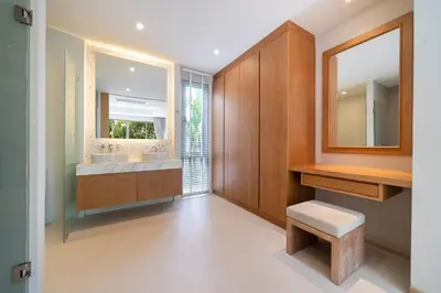 a bathroom with a sink and a mirror at 3 Bedroom Villa with Private pool in Laguna Phuket