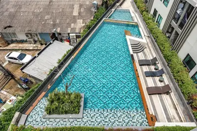 an overhead view of a swimming pool in a building at C203 Prime Area Near Beach, Dining & Shops in Bang Tao Beach