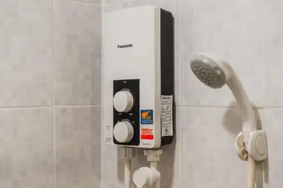a soap dispenser on the wall of a bathroom at C203 Prime Area Near Beach, Dining & Shops in Bang Tao Beach