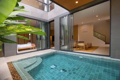 a swimming pool in a villa with a house at Chalong Bay View 3BR Pool Villa Long One B10 in Chalong