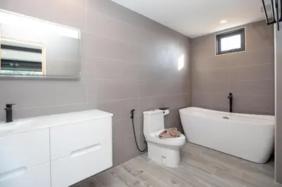 a bathroom with a white toilet and a sink at New 2-Storey Villa Sunset Garden 8 with 4BR & Eco-Pool, near Naiharn in Rawai Beach