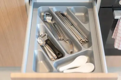 a drawer filled with utensils and silverware at Villa Chandlers - Goldena Twin in Kamala Beach