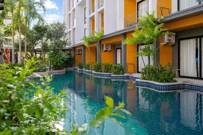 a swimming pool in the middle of a building at Pool View 1310 Wyndham Condo in Nai Thon Beach