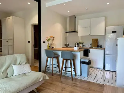a kitchen with a counter and two bar stools at JU3 Halo NEW ВатСaп66935B2I976 in Nai Yang Beach