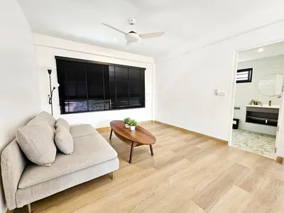 a living room with a couch and a table at Modern 2 Bedroom Pool Villa in Kamala in Kamala Beach