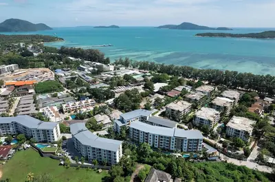 an aerial view of a resort next to the water at Enjoying Stay! New Rawai Beach Residence TTL X412 in Rawai Beach