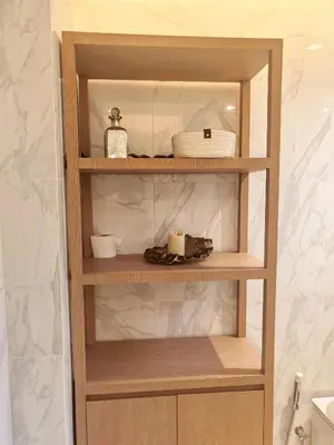 a wooden shelf in a bathroom with some items on it at \u7af9\u5149\u522b\u9662 Bamboo Radiance Villa in Ban Thalat Choeng Thale