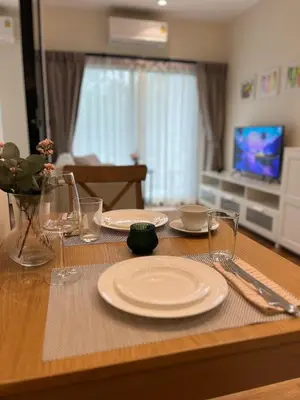 a table with plates and glasses on top of it at МЕ4 Halo NEW2 ВатСaп66935B2I976 in Nai Yang Beach