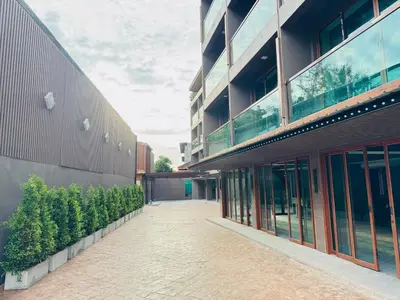 an empty hallway of a building with a courtyard at The Legacy V Beachfront Resort Ao Nang Krabi, Aspira Collection - Adults only in Ao Nang Beach
