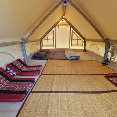 a room with two beds and a couch in a tent at Sea True Valley Phuket ซี ทรู วัลเลย์ ภูเก็ต in Ban Ao Makham