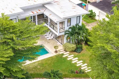 an aerial view of a house with a swimming pool at V212 One Of The Most Beautiful Villa In Phuket in Bang Tao Beach